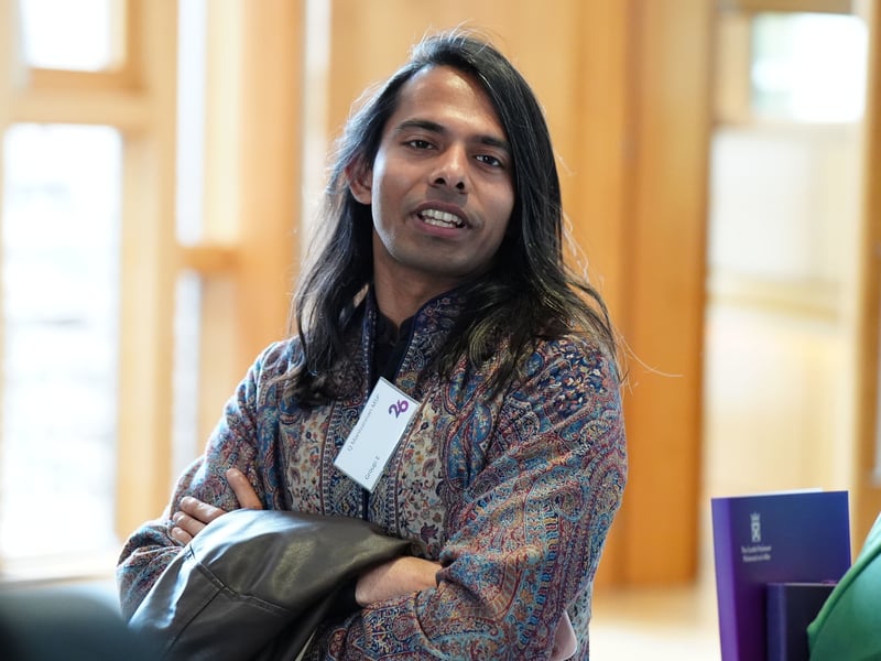 Scottish Green Party MSP Q Manivannan arrives at Holyrood.