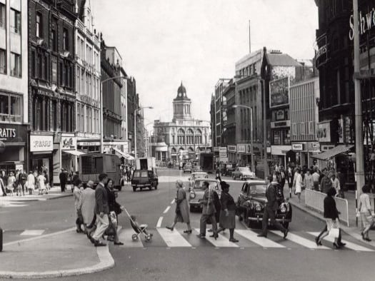Fargate, Sheffield, in the early 1960s, with Davy's Cafe, a popular eating place, pictured three doors below Barratt's shoe shop