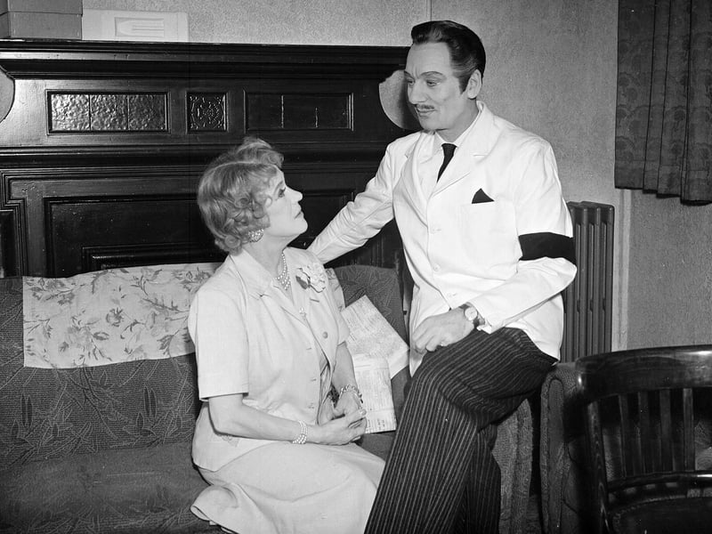 Sir John Gielgud and Kathleen Harrison during the interval  of 'Nude with Violin' at the Lyceum Theatre in October 1956.