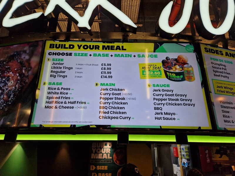 The menu features mouth-watering dishes including flame-grilled jerk chicken, slow-cooked curry goat and tender pepper steak, all served with rice and peas and dumplings