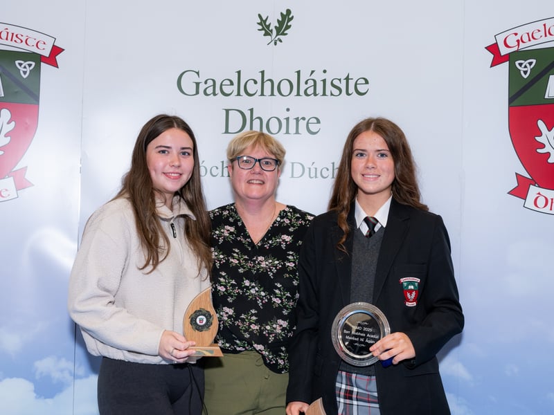 Proud Mum, Orla O’Hagan, with daughters Erin and Mairéad who collected their certificates and prizes.