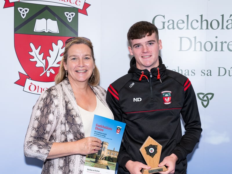 A Level pupil Cathal Ó Mianáin was pictured with proud mum Susan after being recognised for his Hurling All Star Award. Bulaí fir!