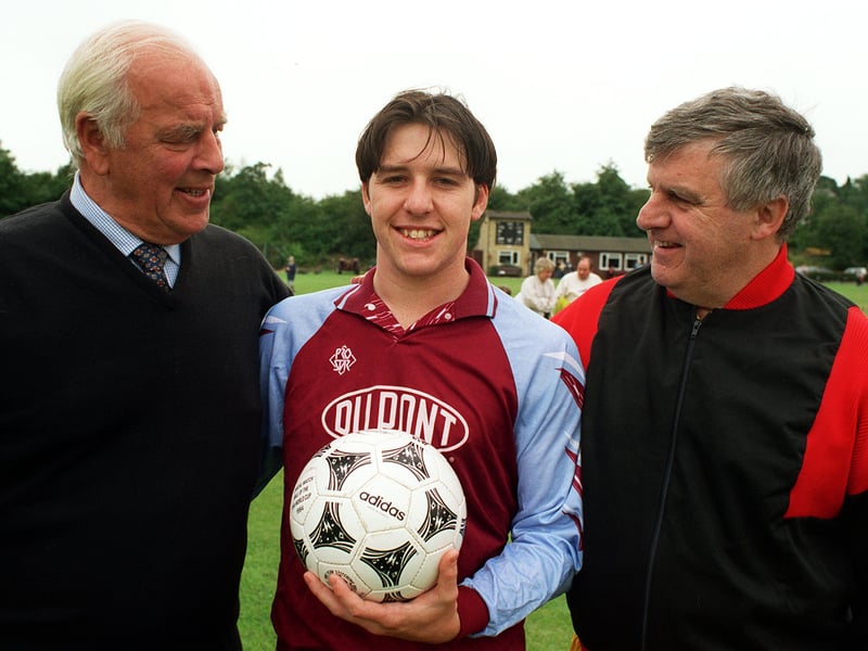 Former Leeds United players, John Charles, left and Peter Lorimer with Martin Bradley at a charity football match.