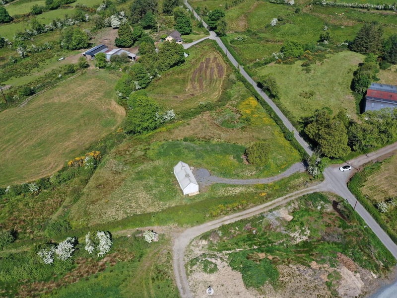 Lavender Cottage in Lavender Cottage in Leitrim, Corriga has gone up for the astonishingly low price of €50,000. The property is partially renovated, with a new corrugated roof, a water connection and a septic tank on site. A savvy buyer will see that there is much to be desired in the condition of the house’s walls. Auctioneer Joe Brady said this cottage is a prime candidate for the Vacant Property Refurbishment Scheme and that “there are things that aren’t visually apparent” done to the property which add value to the listing. “Put another €100,000 into the house, and you’ll have a lovely home for €150,000”, said the seller. Read More: Leitrim Eurovision winner weighs in on RTÉ boycott of competition if Israel competes Brady estimates that the house was built in the 1950s, and said that there has been a large interest in the property since it has gone on the market. He estimates that the property could sell for up to €60,000. The large 1.5 acre site is located in a “rural and tranquil setting”, close to the Cavan border and Carrick-on-Shannon. The house is a two kilometer walk from the village of Aughavas, which is home to a local pub, church, sports ground and national school. The listing on Daft.ie reads: “The elevated site gives excellent views of Sliabh an Iarainn and the surrounding countryside." “Accommodation in brief comprises entrance hallway, living area, three potential bedrooms and potential for bathroom.” REA Brady auctioneers considers the run-down house to be a “gem”.