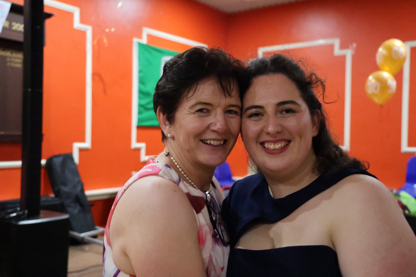 IN THIS helter-skelter world it can be difficult to find time for friends and relations with the years often passing in the blink of an eye. But mother and daughter,  Anna and Niamh Gleeson found the time - 90 years to be precise! Niamh, of Kilteely, said: “My mam turned 60 and I turned 30, so we had a 90th birthday party in Bruff Rugby Club and invited everyone.” The seed for the idea was planted during a chance conversation between Niamh and her aunt, Doris O’Neill, at a funeral last year. “We were saying we only ever meet relations at funerals, weddings, christenings - the big events - and with Covid nobody saw anyone for years. I said to mam, ‘We both have big birthdays next year so let’s have a joint one’,” smiled Niamh. As she is tighthead prop with Bruff’s senior women’s rugby team, the clubhouse in Kilballyowen was an obvious choice and a scrum of people showed up. “It was all relations and friends. A bunch of my college friends and teammates arrived. There were people from all over, mam and dad's friends, people I would've known growing up. “There were people I don't meet up with that often because people are busy and you don't run into them. It was brilliant to see everyone and it felt great to be able to go around to all the different people and say, ‘Thanks for coming’,” said Niamh, who has three brothers - Brendan, Philip and Daniel. Niamh recalled when their dad Mike had a birthday party in The Idler Bar in Knockane a few years ago he brought along buckets for Cliona’s Foundation. “Mam said ‘let’s get onto Cliona’s Foundation’ and we asked people to give them a donation instead of giving us a present or money in a card. “They're paying to support parents with very ill children, which has a lot more meaning to it,” said Niamh Between cash donations, attendees ‘tapping’ their cards or phones, and Revolut, a total of over €1,400 was raised from the 90th birthday bash. “I just want to thank everybody who gave up their time to come along to
