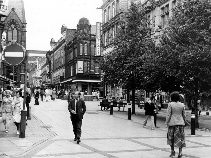 Lands Lane looking towards The Headrow in April 1972. Left and right the junctions with Albion Place are visible. The Church Institute building is on the left hand corner and John Peters furnishing stores is on the right. John Peters also occupies the ground floor of Scala House which opened as a cinema in 1922