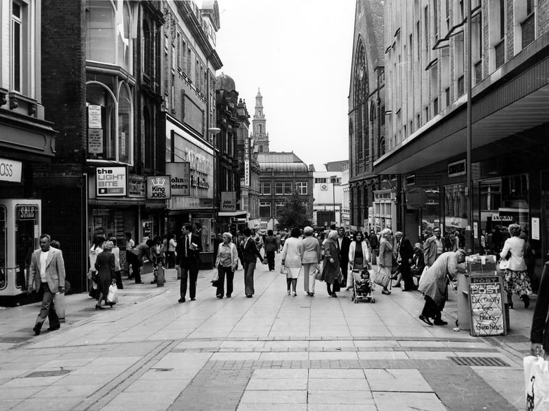 Lands Lane looking in the direction of Commercial Street in April 19i72. On the left are: The Light Bite, King Jobs, job centre at number 26, John Peters'Furniture Store in the 1922 Scala House, formerly a cinema and Ivey Travel on the corner with Albion Place.