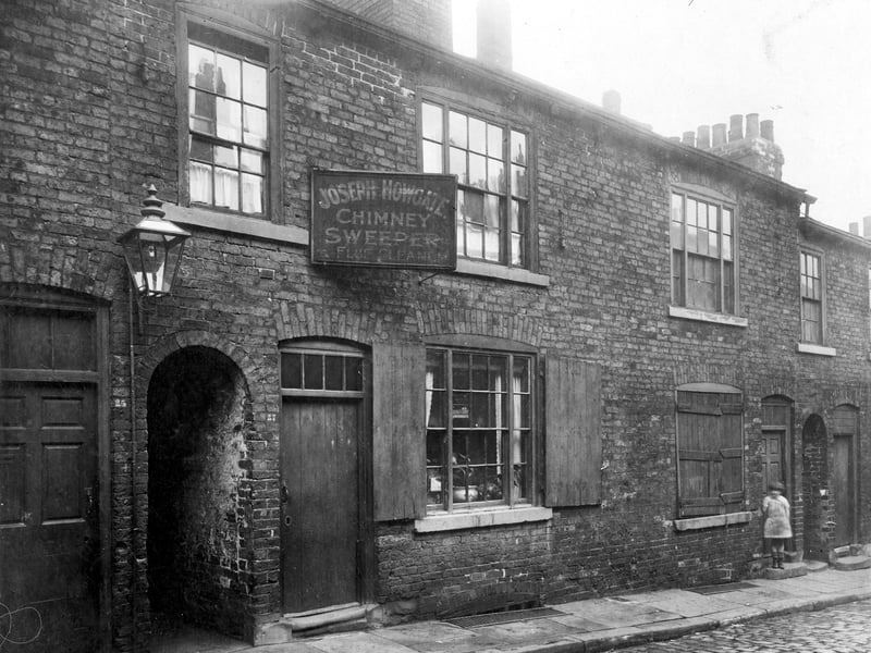 Nelson Street ran alongside Union Street, was demolished to widen what became Eastgate in the early 1930s. Number 27 is the home of Joseph Howgate, chimney sweep and flue cleaner. To the left of his home an alley leads to the rear of the premises, gas light fitted to the wall. Pictured in November 1927.