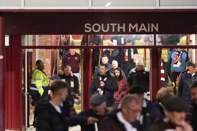 Disappointed Hearts fans leave Tynecastle after a late Celtic penalty at Motherwell denied them the chance to go three points clear at the top of the table.