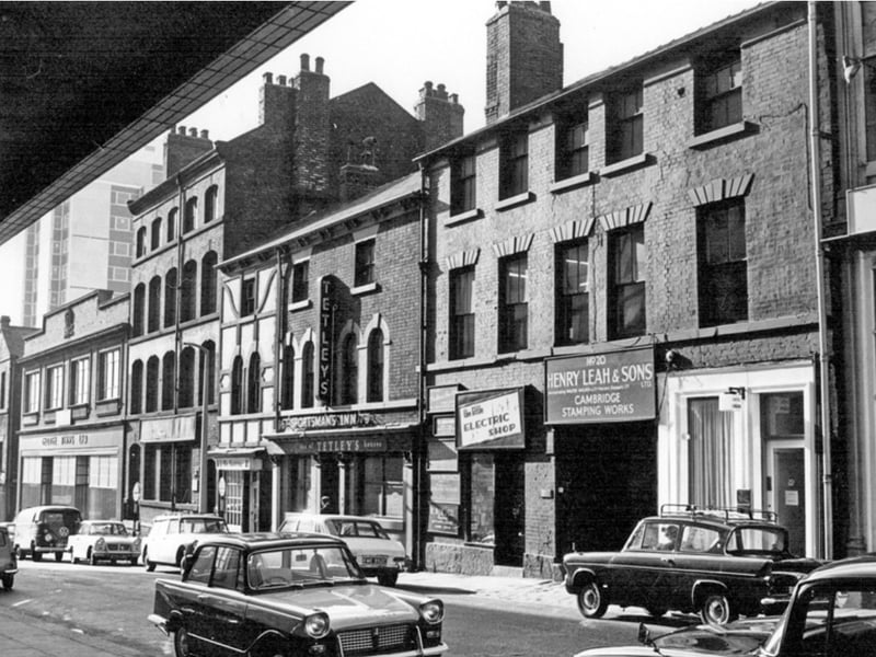 Cambridge Street, Sheffield city centre, in 1966, showing Henry Leah and Sons, silver stampers; Sportsman's Inn; Cambridge Coffee House; Brook Bros, electro platers (Albert Works); and George Binns, outfitters