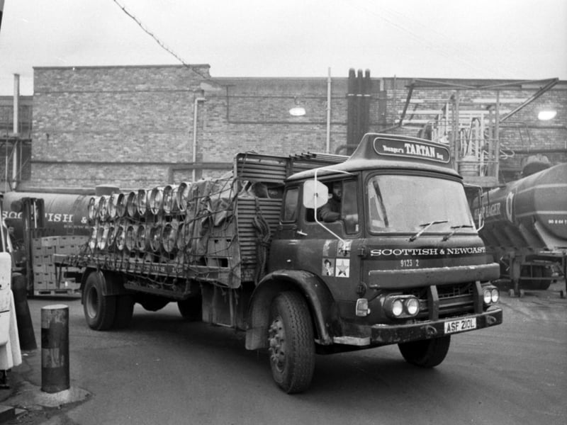 Scottish & Newcastle lorries leave Fountainbridge Brewery with kegs of Tartan Special in January 1978