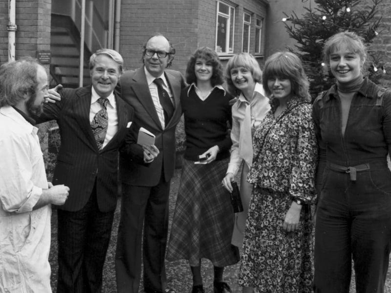 Eric Morecambe and (left) Ernie Wise meet some of the employees during a visit to the Heriot brewery at Roseburn, Edinburgh, in December 1978