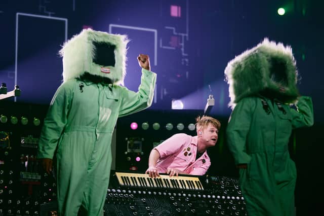 LOOK MUM NO COMPUTER performing Eins, Zwei, Drei on the Eurovision 2026 stage.