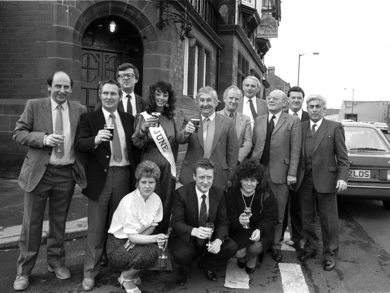 A toast to the new Gothenburg Tavern, formerly the Forth Tavern, in Prestonpans, re-opened under the new name by Tennents Caledonian Breweries, in November 1986. Tennent's girl Diane Lake and Councillor Tom Wilson and guests raise their glasses.