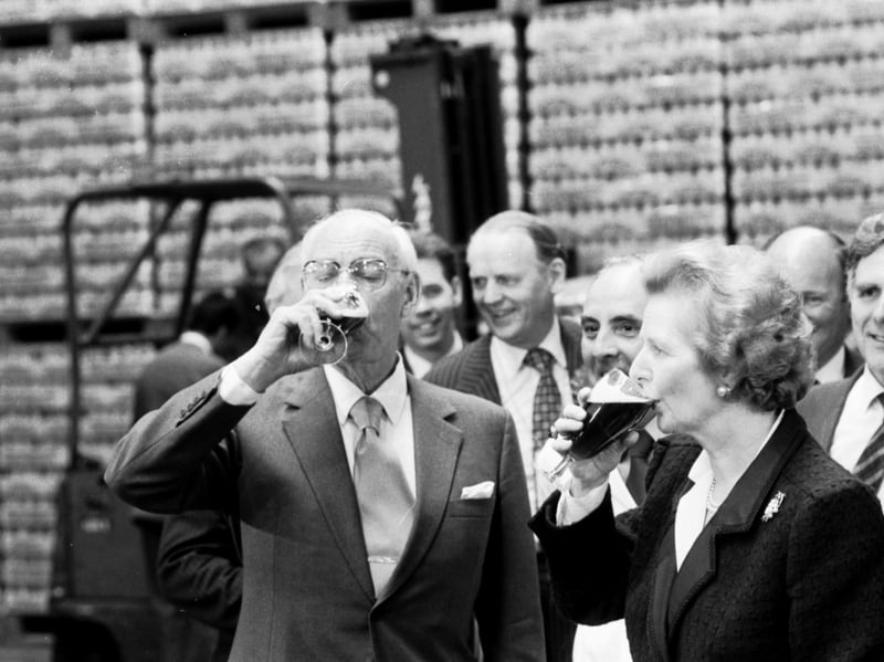 Prime Minister Margaret Thatcher and her husband Denis sample the beer at the Scottish & Newcastle brewery in Edinburgh during a visit in June 1987