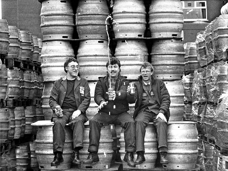 Fountain Brewery workers Harry Traunter, John Smith and Tom Owens celebrate in March 1989 after a planned merger by the Australian company Elders IXL with Scottish & Newcastle Breweries fails