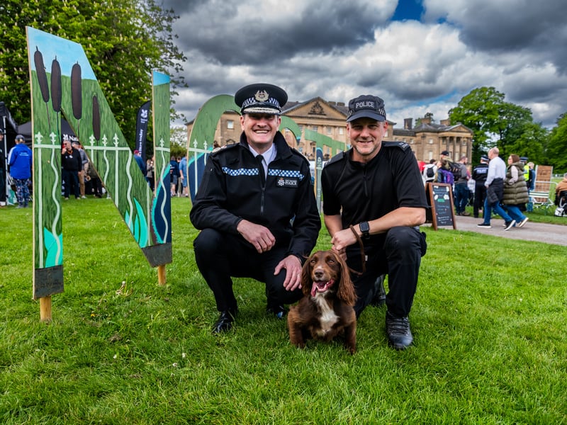 Pictured Chief Constable West Yorkshire Police Sir John Robins, with PC Duncan Matthew and one of their specialist sniffer dog.