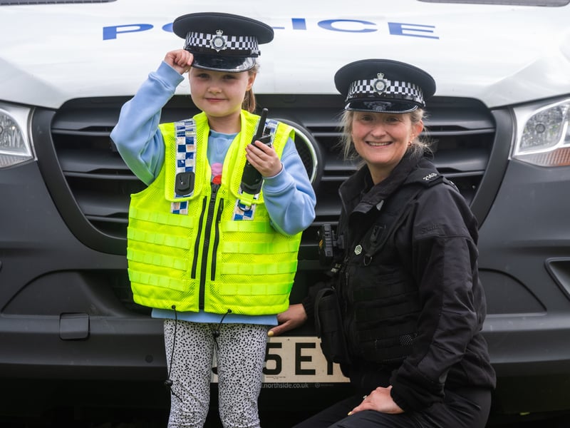 Phoebe Shine, aged 6, of Rothwell, Leeds, with PC Donna Smith.