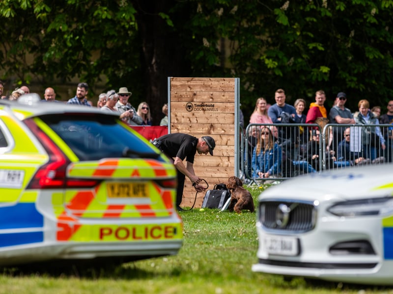 PC Duncan Matthew with a specialist sniffer dog.