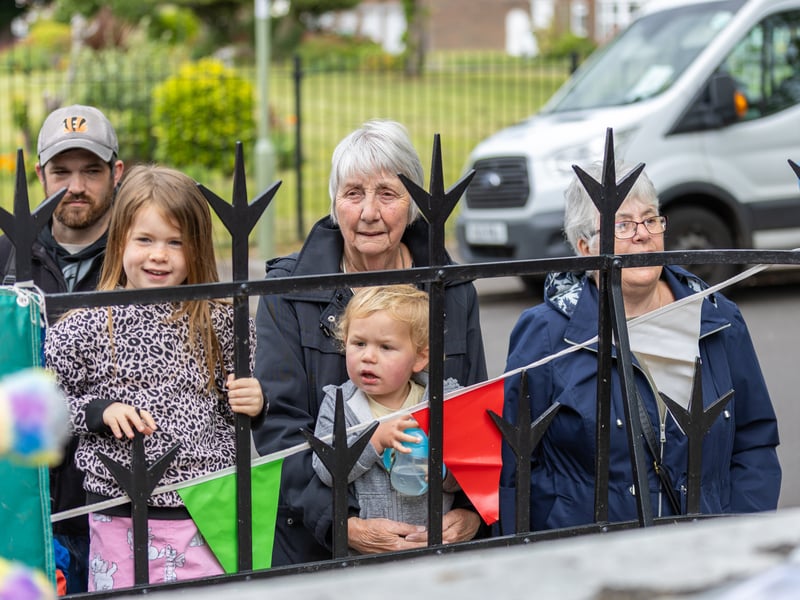 Families look on at the teddy bear zip wire.