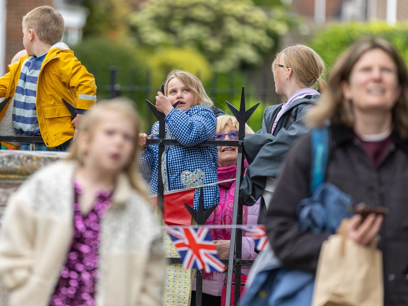 Onlookers see a teddy bear on the zip wire.