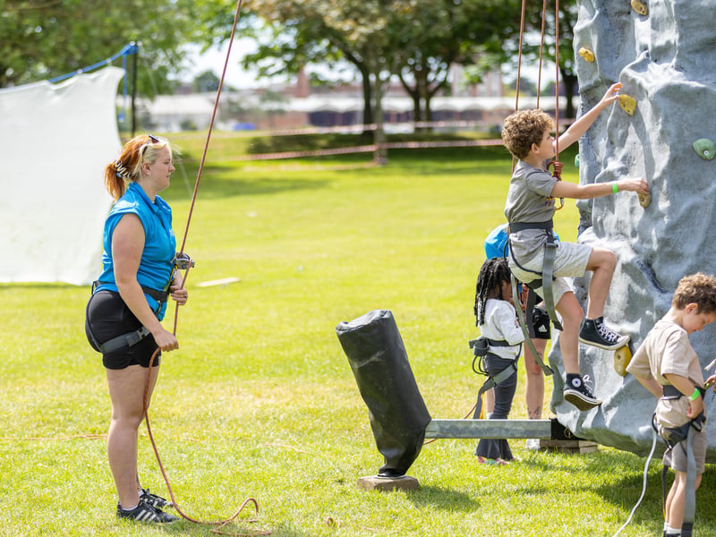 Rock climbing in Walpole Park.