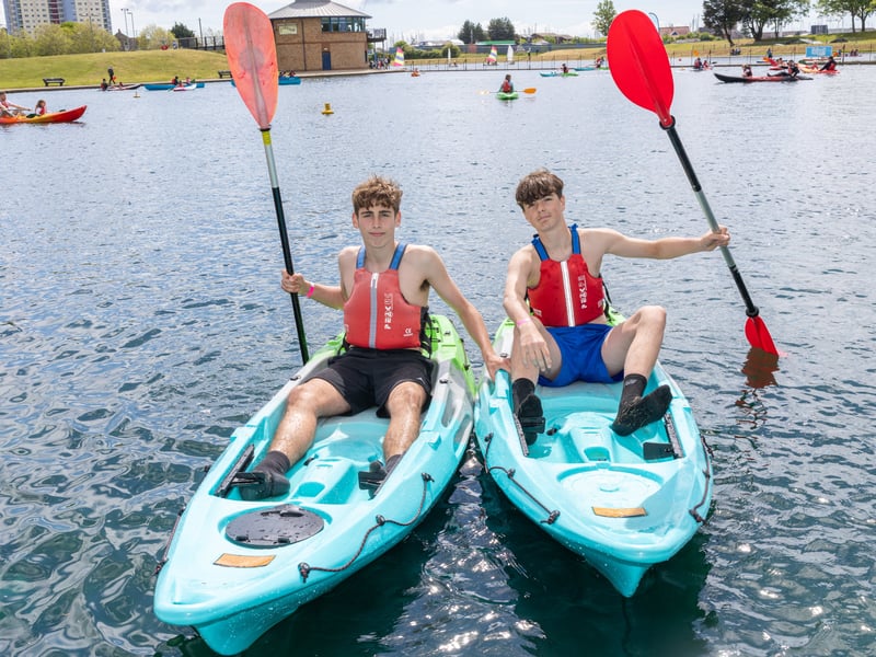 Logan and Reggie on the kayaks.