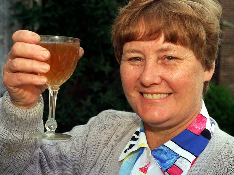 This is Sheila Capstick who was celebrating victory in the fight for women's WMC votes in May 1996.
