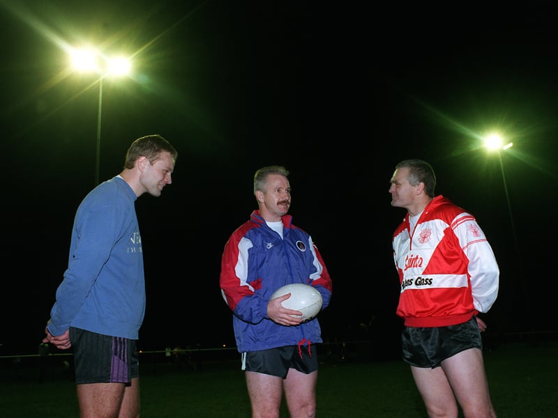 Eastmoor Dragons coach Dave Ellis, centre, discusses tactics with James Ganley, left, and Mick Trei in October 1998.