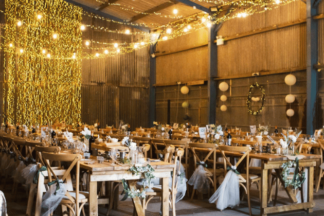 For couples looking for a rustic, laid-back vibe, this charming family-run farm venue offers a beautiful blank-canvas barn setting. It caught the attention of our readers as a top choice for a customized, countryside celebration just on the regional border.