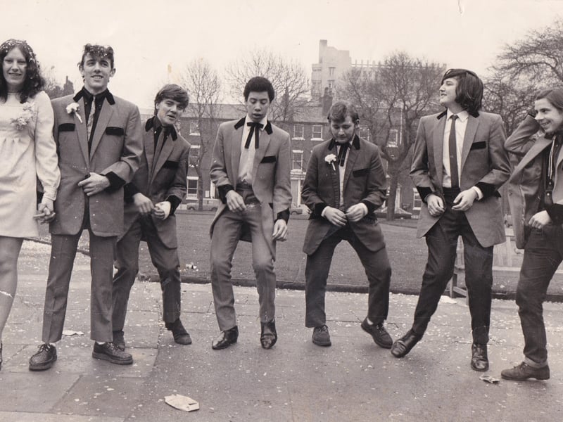 A bride and bridegroom, on left, and five of the bridegroom's Teddy Boy friends jive in Park Square Gardens in February 1973 after a wedding at Leeds Registry Office. The bride was Sharman Dearlove and the bridegroom was Michael Shaw. The five friends, from left, are Danny Gardner, Michael Allotey, Peter Shaw, Neil Higginbottom and Graham Turner.