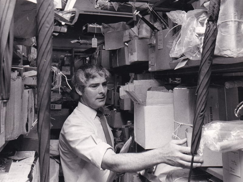The Aladdin's Cave of the Post Office - Clarence Bateman among the racks and racks of lost property at Quebec Street in August 1973.