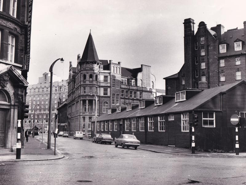 National Employers House on Quebec Street pictured in October 1973. Also in the photo is the old wooden building used by the General Post Office.
