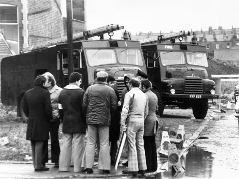 Pickets from the fire brigades union at Holbeck Police Station where the army has two fire tenders stationed in November 1977.