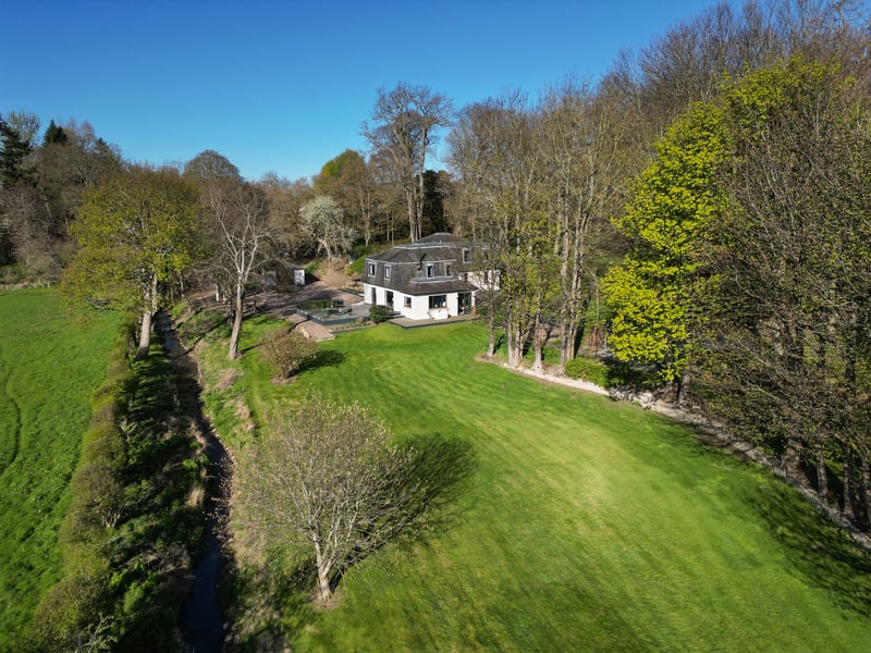 There are a variety of places in close proximity to the house ideal for relaxing outside including a large terrace off the sitting room, a BBQ area accessed from the conservatory, a roof terrace and an outdoor insulated bath with hot water accessed from the boot room.