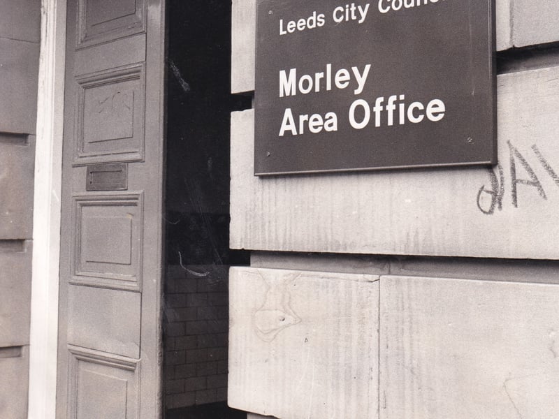 July 1974 and this wooden sign put up on Morley Town Hall was considered to be an intrusion by townsfolk. "We realise that Leeds has the full backing of the law but it would please very many thousands of Morleians if they would consider removing this sign from our beloved town ahll, said Sir Harry Hardy, chairman of Morley Civic Society. 