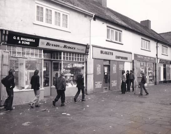 A parade of shops on Throstle Lane pictured in January 1974.