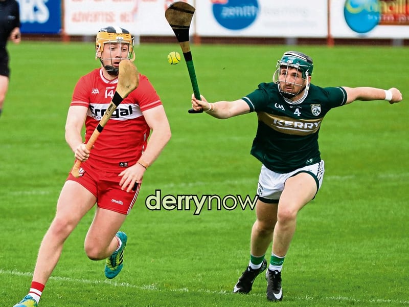 Derry's Shea Cassidy in a battle for the sliotar with Kerry's Kyle O'Connor.