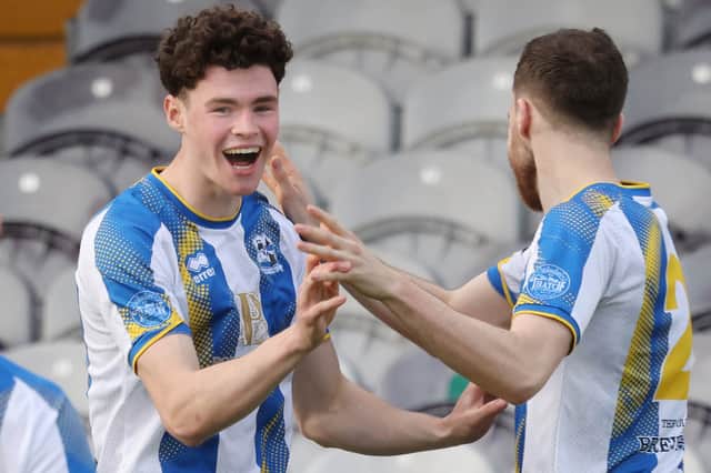 Donnacha McNamara celebrates after scoring Maree-Oranmore's first goal.