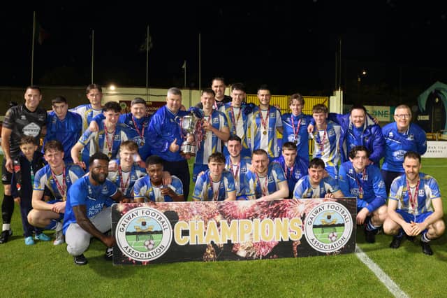 The Maree/Oranmore squad celebrate after the final whistle in a pulsating Michael Byrne Cup final.
