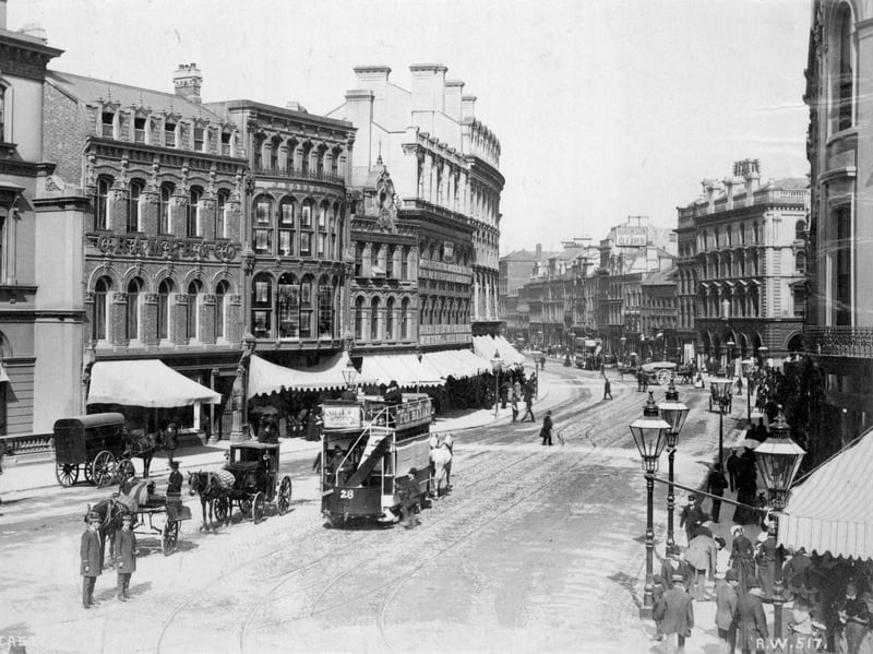 Castle Place, Belfast with horse-drawn trams and hackney cabs, in 1875