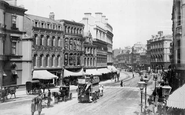 Castle Place, Belfast with horse-drawn trams and hackney cabs, in 1875