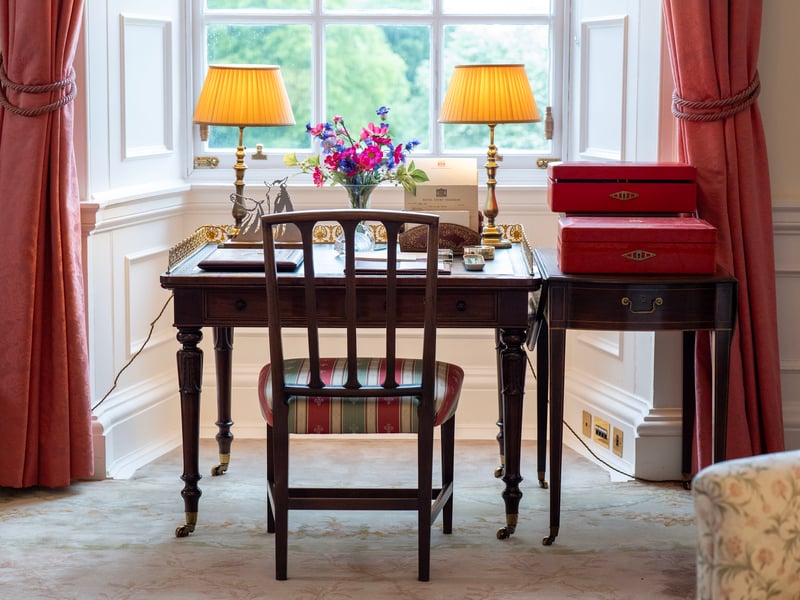 The desk in the Sitting Room where the late Queen Elizabeth II would work, reviewing the
papers and documents presented in the Government red dispatch boxes, at the Palace of Holyroodhouse in Edinburgh, the official residence of the monarch in Scotland. 