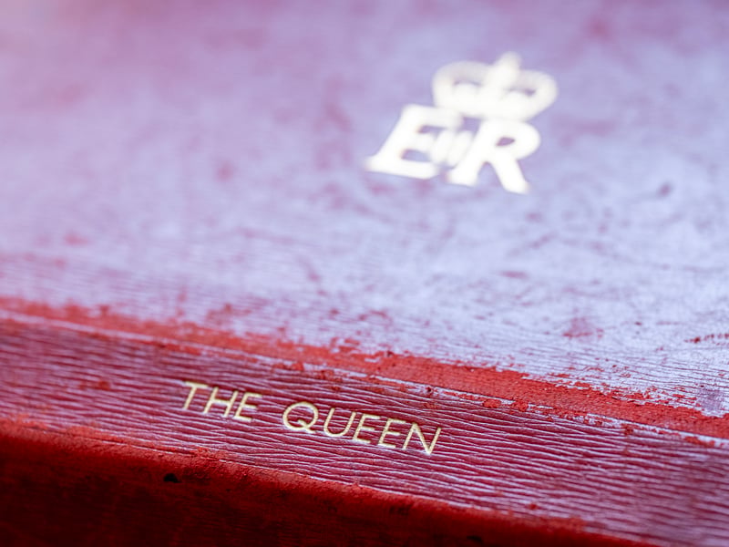 One of the Government red dispatch boxes on the desk in the Sitting Room where the late Queen Elizabeth II would work, reviewing the papers and documents, at the Palace of Holyroodhouse in Edinburgh, the official residence of the monarch in Scotland.