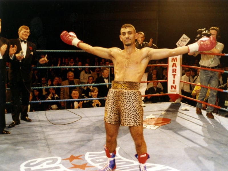 'Prince' Naseem Hamed poses after retaining his WBC International Super Bantamweight Title against Armando Castro at the Scottish National Exhibition Centre, Glasgow, in January 1995. He grew up in Wincobank, Sheffield, and attended Hinde House School.