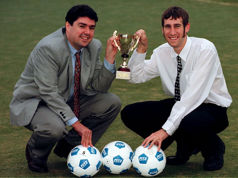 Pictured in September 1997 are Sean Tracey (General Manager) and Michael Fenner (Assistant Manager) with the Scanner 5-A-Side Tournament Trophy at the Pitz football complex in Sighthill.