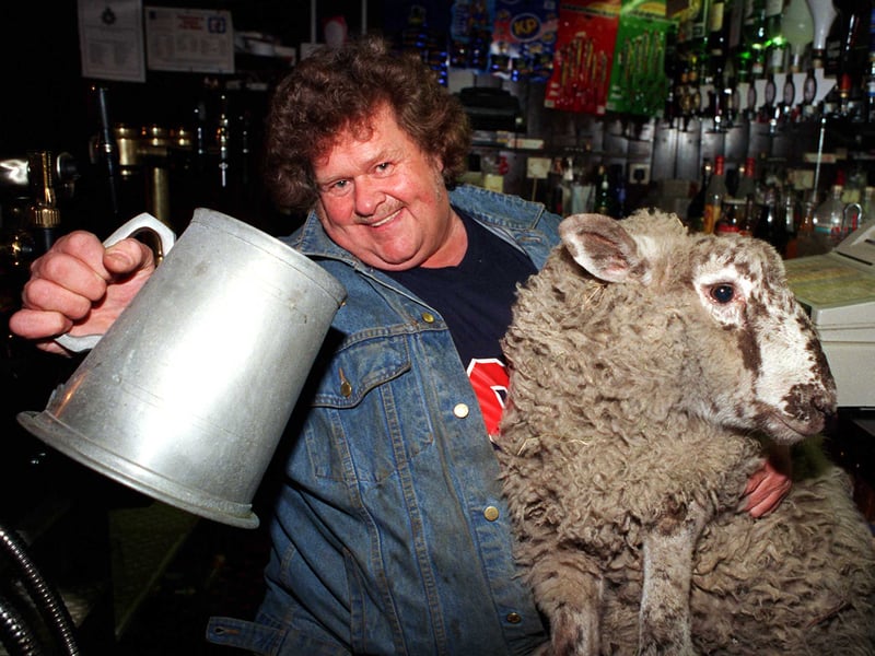 Sam Thacker, landlord of the White Hart pub, Penistone, with his pet sheep, Bandit, in January 1999