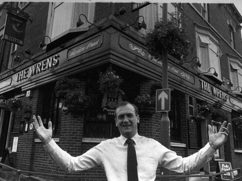 The landlord of The Wrens Pub, New Briggate, Leeds, pictured outside after it won top prize in the Leeds in Bloom awards in July 1988