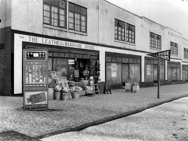 Barkly Parade, on Dewsbury Road in December 1938. On left is the leather and hardware store, cigarette machine can be seen outside store.