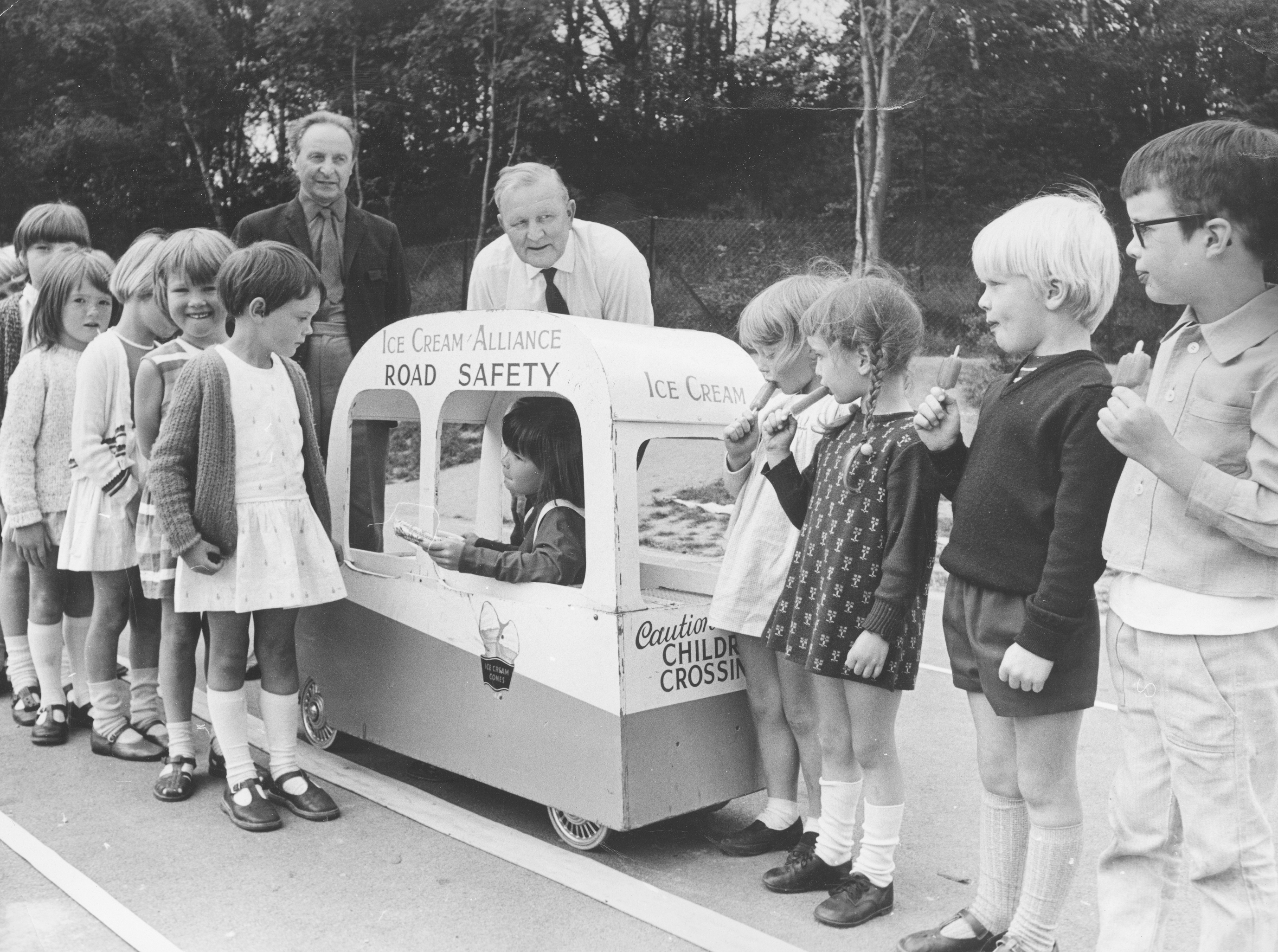 A summer’s day at Woodside Infants’ School in 1971. Six-year-old Susan Wood is pictured happily serving treats to her friends during a special road safety session organised with the help of the Ice Cream Alliance. Looking on are Shropshire County Road Safety Officer Mr A E John and Mr G Moruzzi of Blewshill Creamery, vice-chairman of the alliance’s road safety committee. 